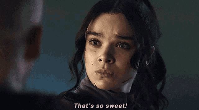 a woman says that 's so sweet in purple letters