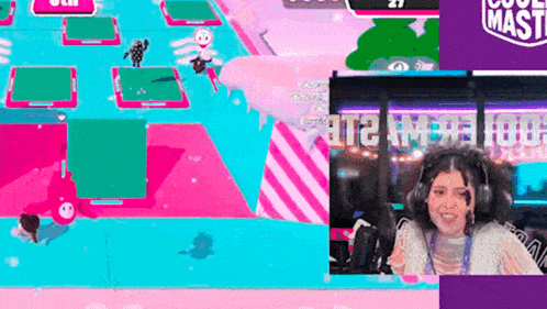 a woman wearing headphones is playing a video game with a pink and blue background .