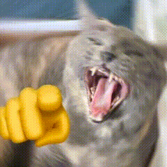 a close up of a cat with its mouth open and a yellow fist pointing to it .