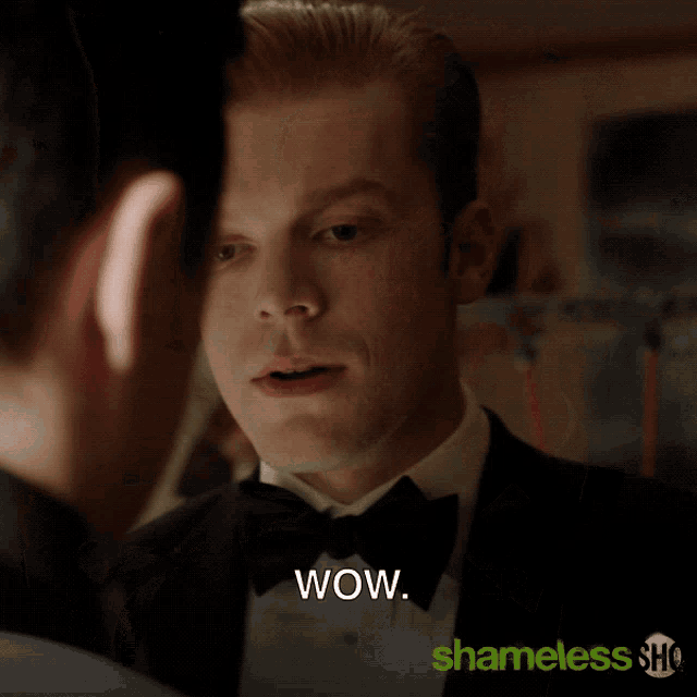 a man in a tuxedo says you 're an ugly mother fucker