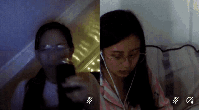 a woman wearing glasses is holding a cell phone next to another woman wearing earbuds