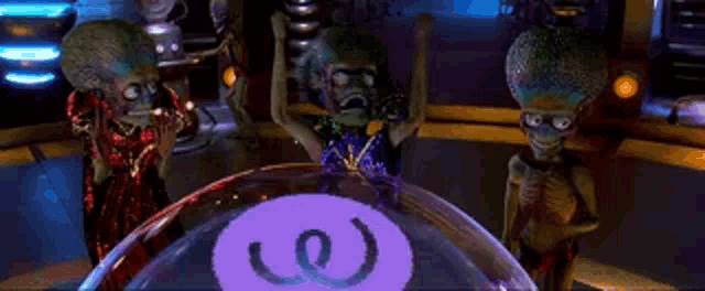 a group of aliens are standing around a purple ball with a smiley face on it .