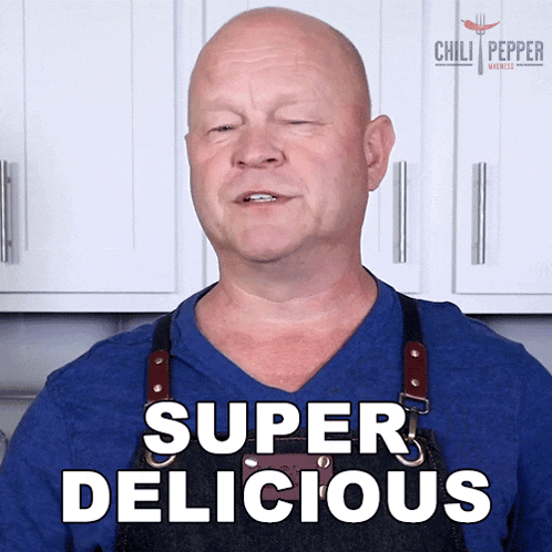 a man wearing a blue shirt and apron says super delicious