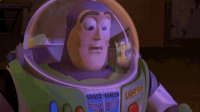 buzz lightyear from toy story is wearing a helmet that says space ranger on it