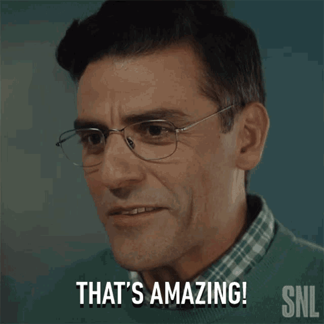 a man wearing glasses says that 's amazing on snl