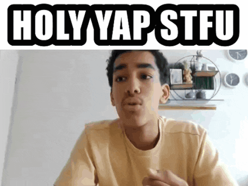 a young man in a yellow shirt with the words holy yap stfu above him