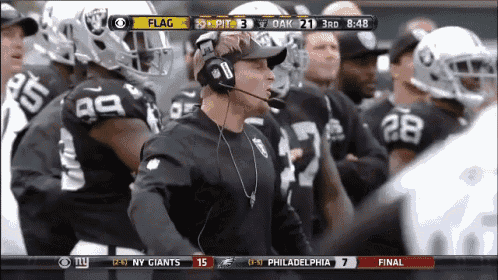 a football game is being played between the raiders and philadelphia