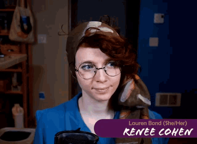 a woman wearing glasses and a scarf with the name renee cohen