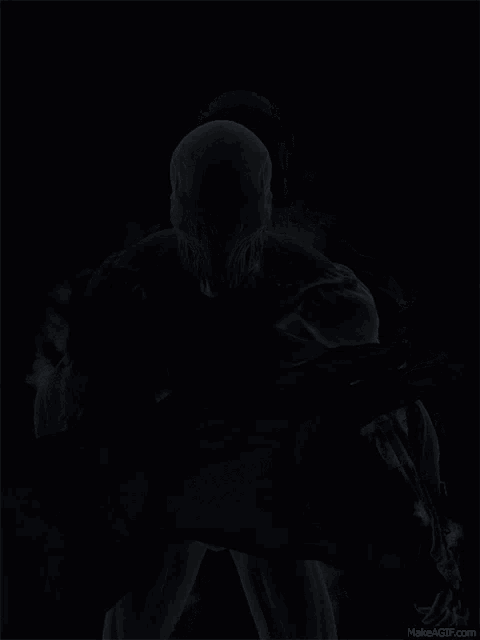 a silhouette of a person in the dark with makeagif.com at the bottom of the image