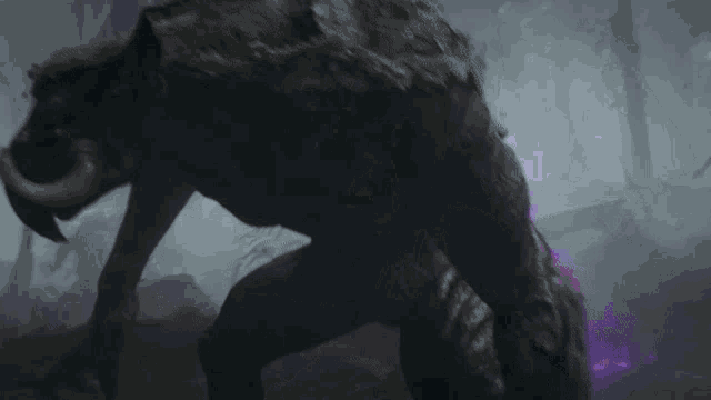 a purple light is coming out of a monster 's body