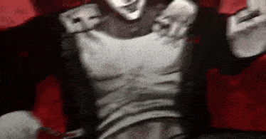 a black and white drawing of a man in a white shirt with a red background .