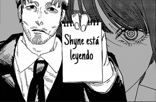 a man in a suit and tie is holding a piece of paper that says " shyne esta leyendo "