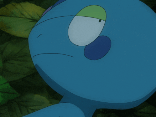 a blue cartoon character with a green eye and a blue nose