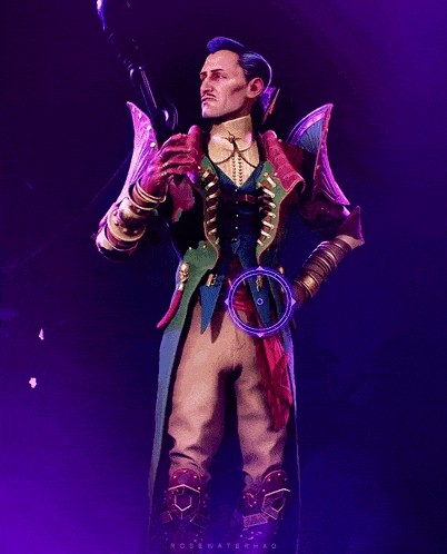 a man in a colorful costume is standing in front of a purple background that says rosewatermag on it