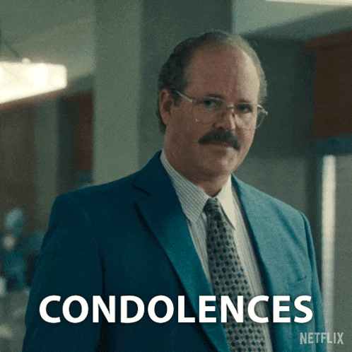 a man in a suit and tie says condolences on a netflix ad