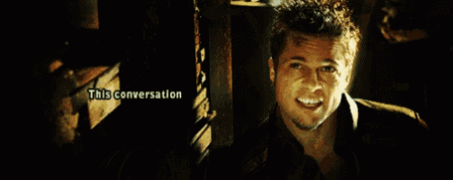 a man and a woman are looking at each other and the words is over are visible