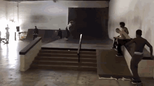 a group of skateboarders are doing tricks on a ramp at a skate park