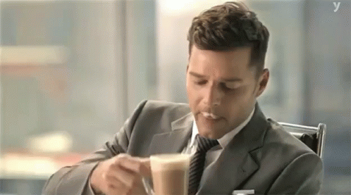 Ricky Martin Tomando Cafe GIF - Ricky Martin Cafe Sips Coffee GIFs