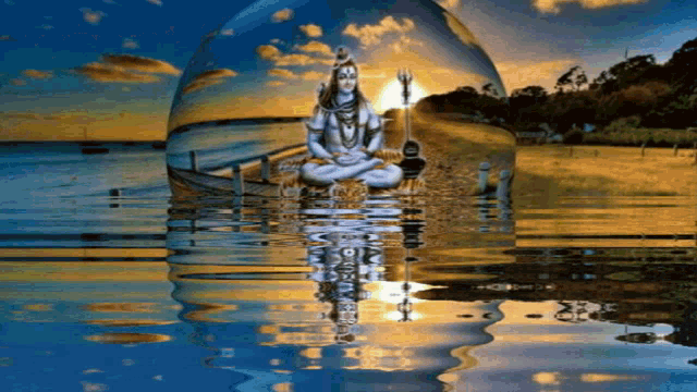 a statue of shiva sits in a bubble of water