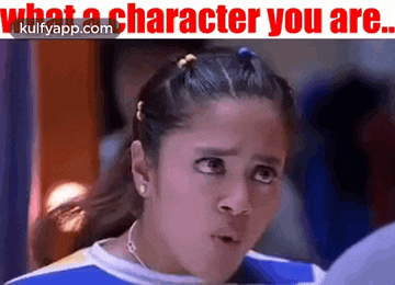 a girl is making a funny face with her mouth open and the words `` what a character you are '' written above her .