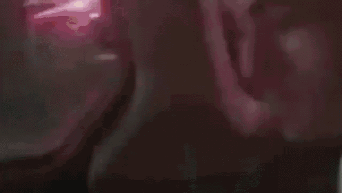 a screen shot from hollywire shows a man looking out of an airplane window