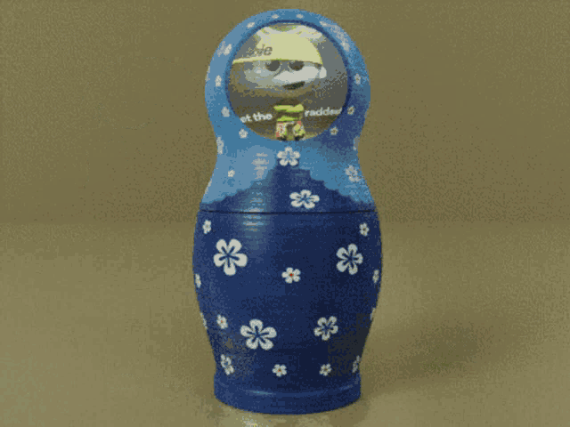 three russian nesting dolls with one that says reddest