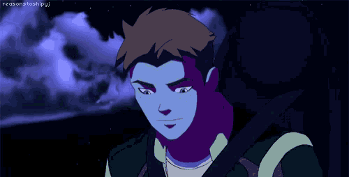 a cartoon character with a purple face is smiling while sitting in a car .