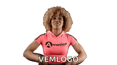 a woman is wearing a pink shirt that says motion