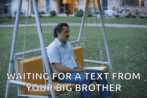 a man is sitting on a swing with the words " waiting for a text from your big brother "