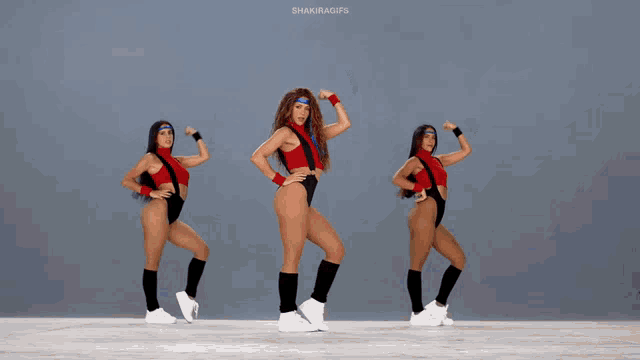 a gif of three women dancing with the words shakiragifs at the top
