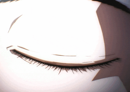 a close up of a person 's eye with the letters t and i visible
