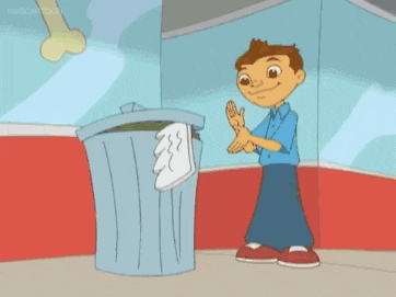 a cartoon boy is standing in front of a trash can and clapping his hands .