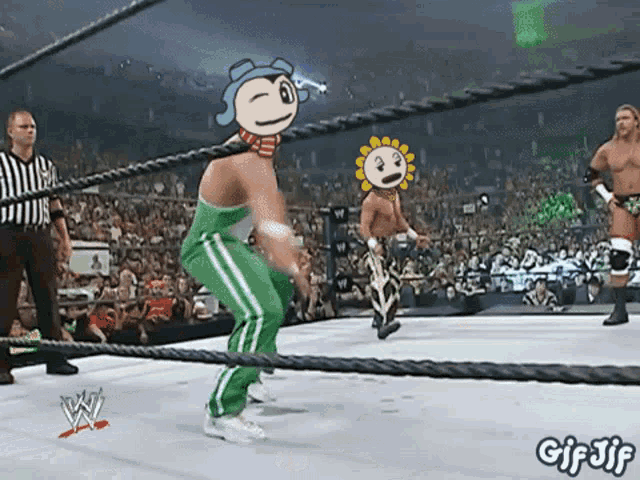 a gif of wrestlers in a wrestling ring with the words gif jif on the bottom