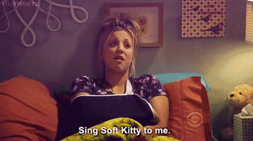a woman with a cast on her arm says sing soft kitty to me