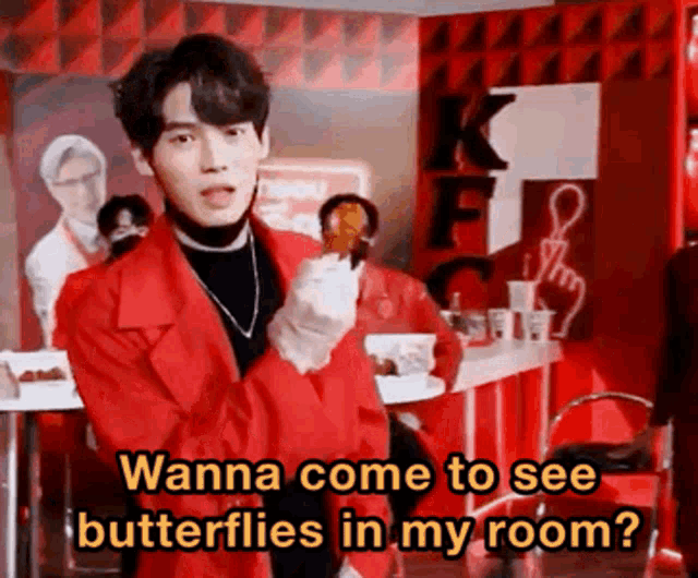 a man in a red jacket is holding a chicken wing and says wanna come to see butterflies in my room .