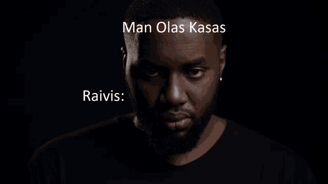 a man with a beard is looking at the camera with the words man olas kasas written above him