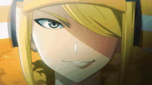 a close up of a woman 's face with a yellow hat