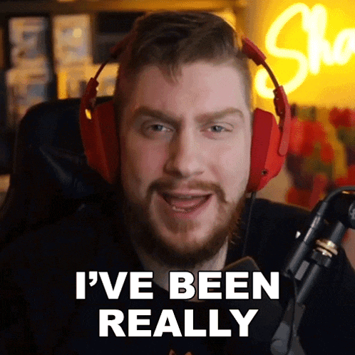a man wearing red headphones says " i 've been really "