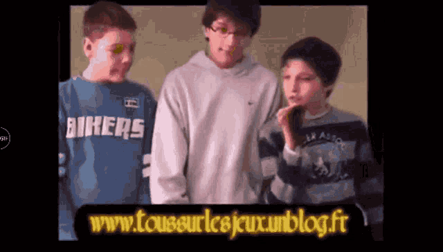 three young boys wearing sweaters that say bikers are standing next to each other