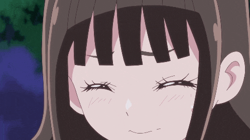 a close up of a girl 's face with long hair