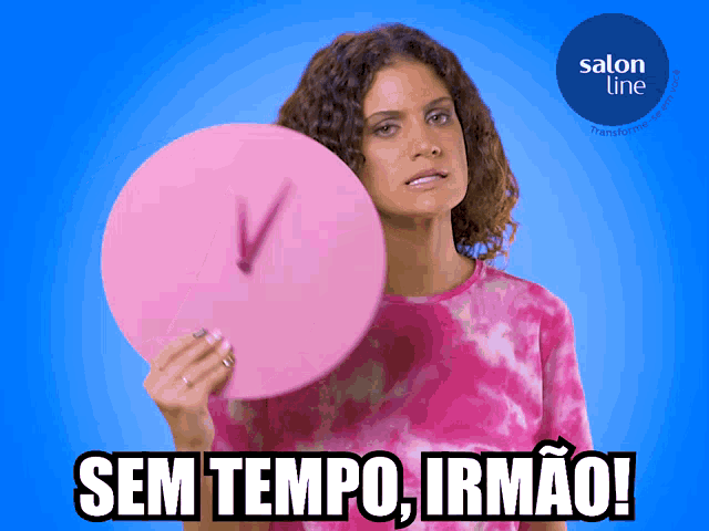 a woman holding a pink clock that says sem tempo irmao on it