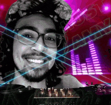 a man wearing glasses and a hat is smiling in front of a sign that says amy