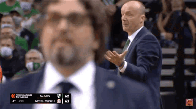 a basketball game between zalgiris and bayern munich is being played