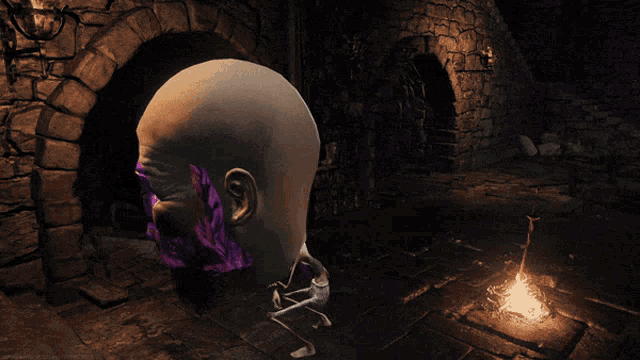 a statue of a man 's head is in a dark room with a fire in the foreground