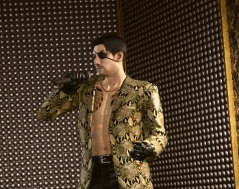 a shirtless man in a snakeskin jacket sings into a microphone