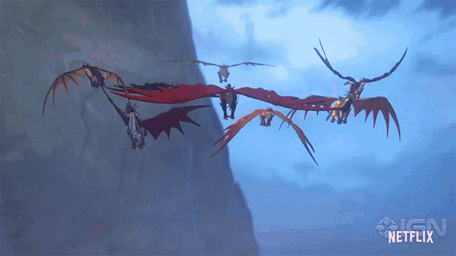 a group of dragons are flying in the sky with a netflix logo in the corner