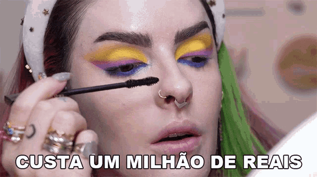 a woman applying mascara with the words custa um milhao de reais in the background