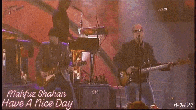 a man singing into a microphone with the words mahfuz shahan have a nice day on the bottom