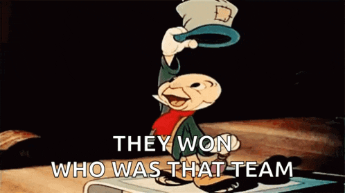 a cartoon character is holding a baseball cap in the air and says they won who was that team .