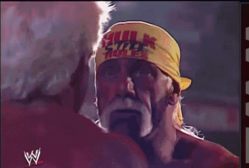 hulk hogan is wearing a headband that says hulk rules on it